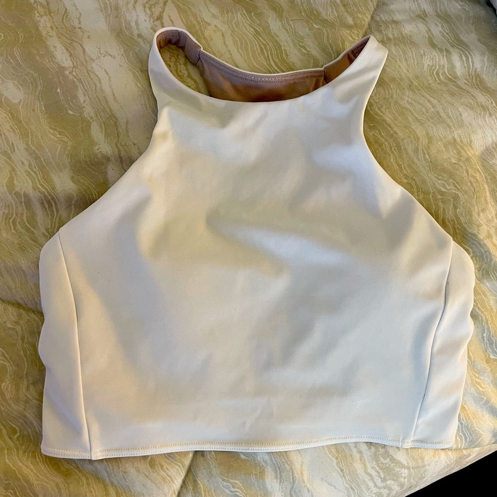 Lululemon size 4 White sports bra. Barely worn. Excellent condition